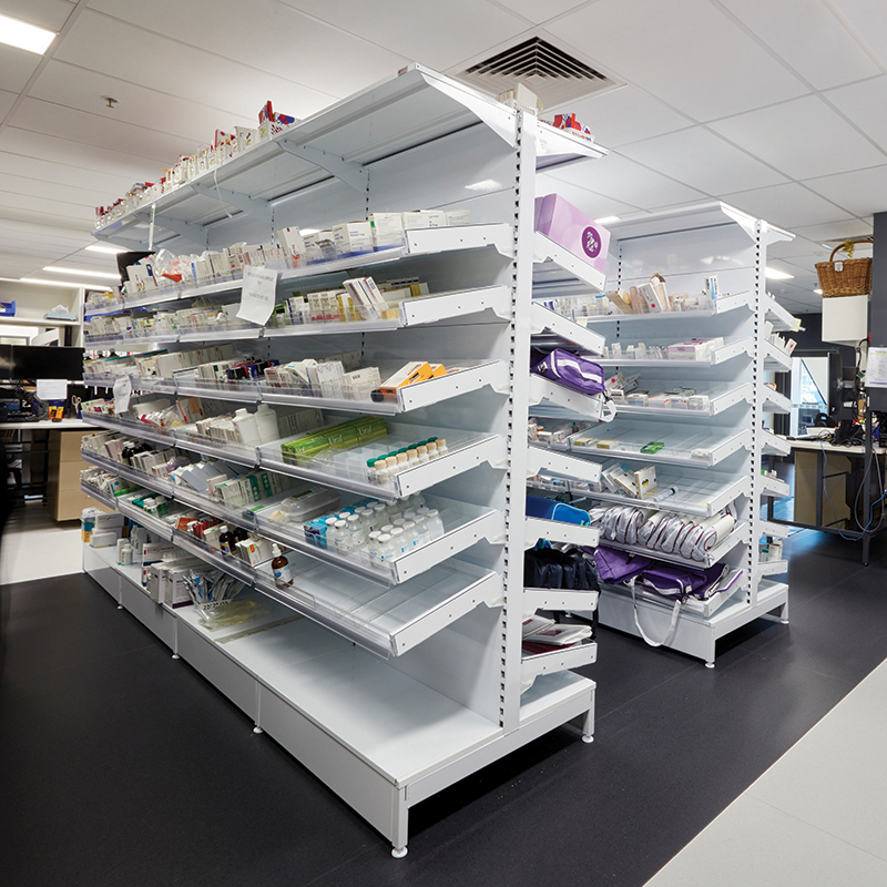 A pharmacy dispensary with shelving